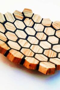 Hexagonal decorative bowl from @pushpakkalsait. A chic example of popsicle stick crafts for adults.