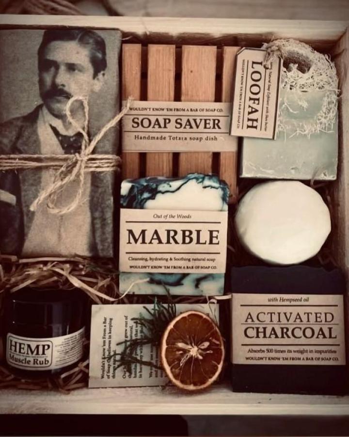 Vintage grooming gift box from @wouldntknowem featuring natural soaps, wooden saver, and hemp rub with twine details.
