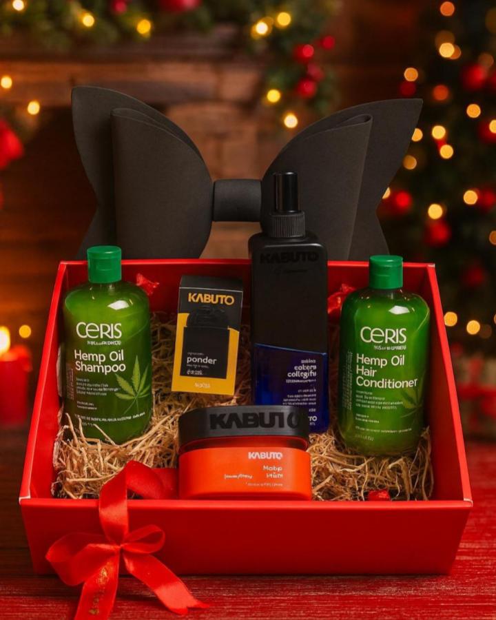 Red gift box with grooming products from @cerishair featuring christmas gift box ideas for men with hemp oil shampoo and bow tie.