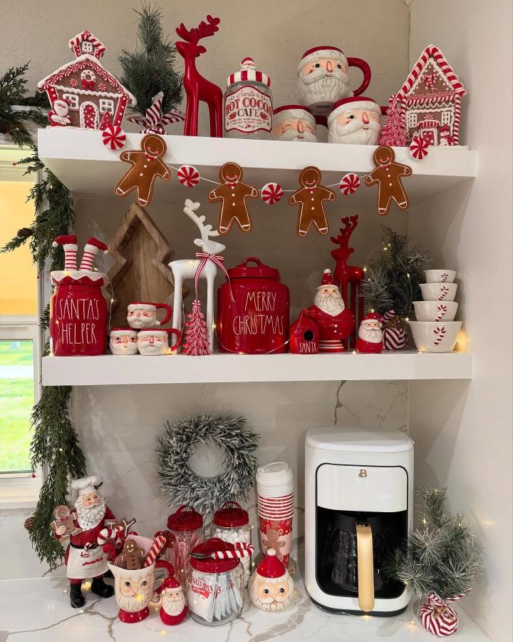 Red and white shelving display from @rubyylove19 with gingerbread garland and festive mugs.