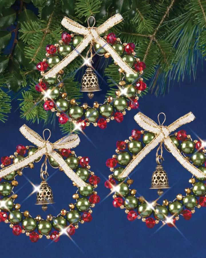 Beaded wreath ornament kit from SolidOakCrafts for family christmas craft night ideas with green pearls and red crystals