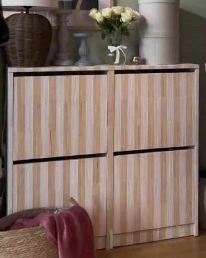 Light and medium striped wood veneer Ikea Bissa drawers with black detail from @diveinsidenumber45 warm natural tones and simple decor ikea bissa hacks & ideas
