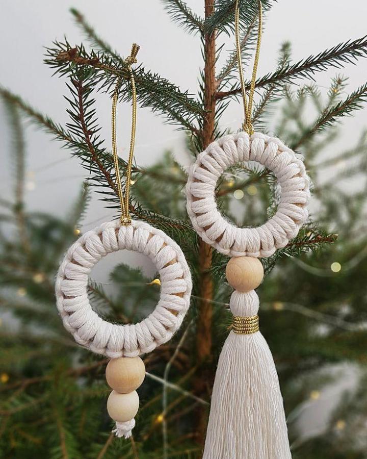 Cream wrapped wreath ornaments from Rox Shana Macrame. Gold cord and wooden beads add texture.