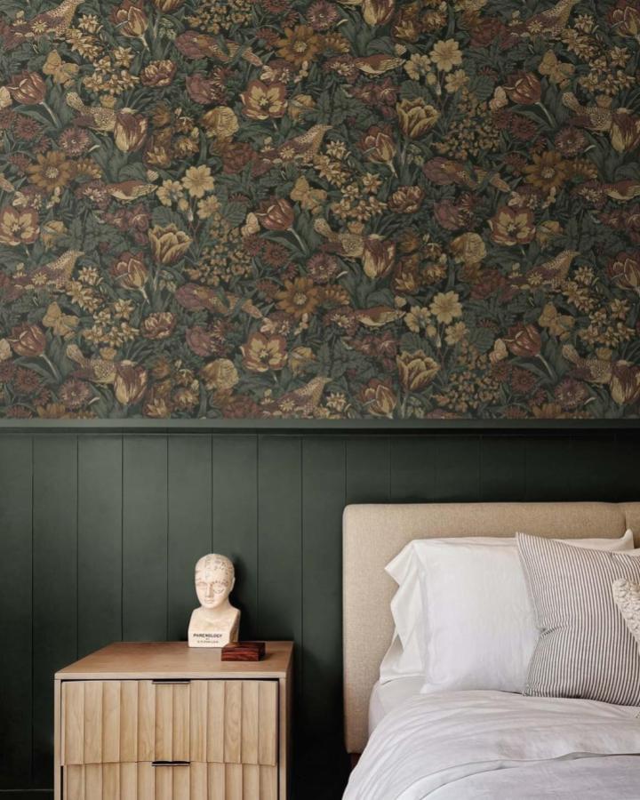 Dark green vintage floral peel & stick wallpaper ideas in bedroom from @nextwallwallpaper with cozy wood furniture and soft bedding.