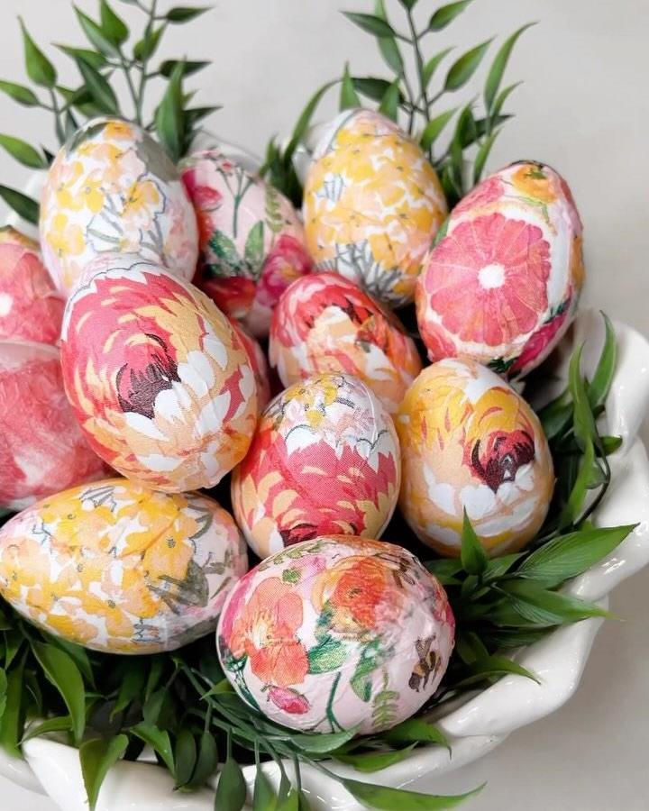 colorful floral napkin decoupage Easter eggs in white bowl with greenery from @jeannaloveschristmas perfect easter egg craft ideas for adults