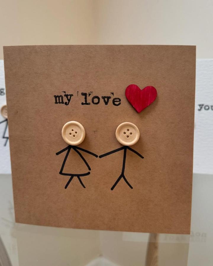 Natural wooden buttons and red heart on brown card from @keltacreations handmade valentines card ideas simple craft design