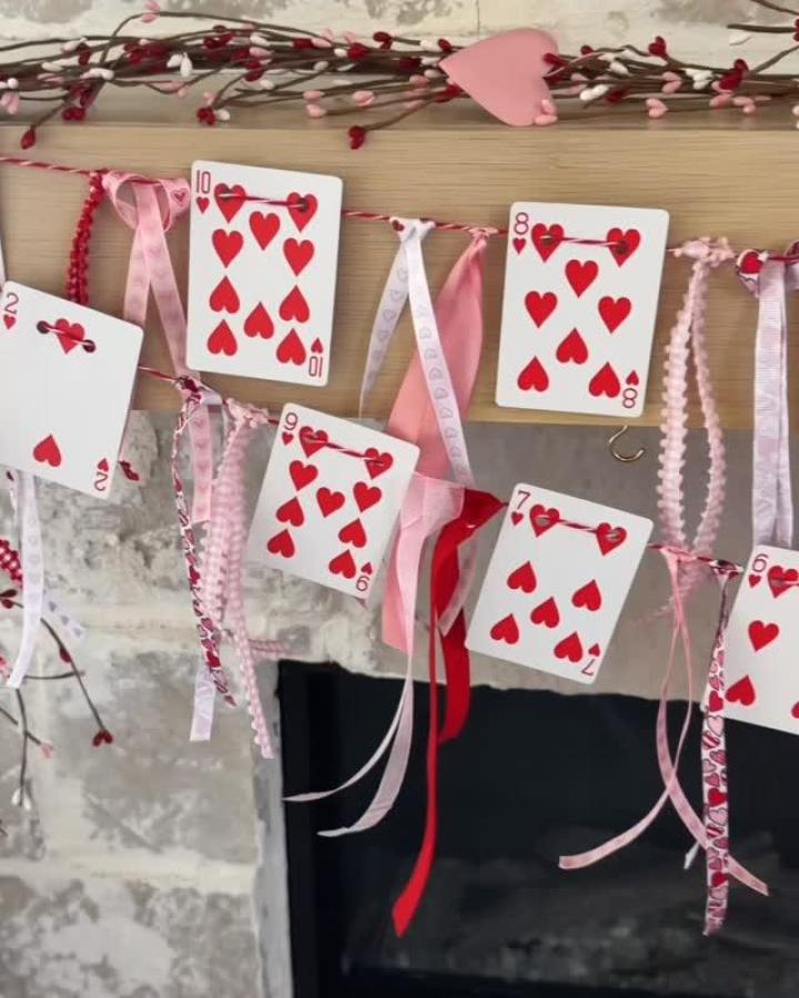 red and pink ribbon and heart playing card garland from @heyitskayzie valentines crafts for adults casual whimsical decor