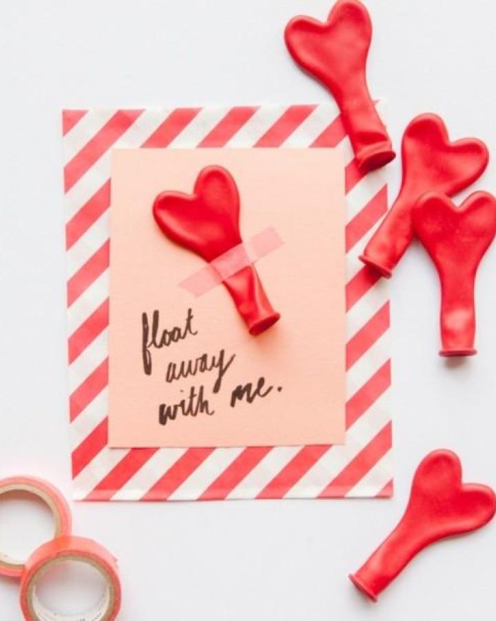 Red heart balloon accents on pink and red striped paper valentines paper craft ideas from @printworksdiy playful and bright card design