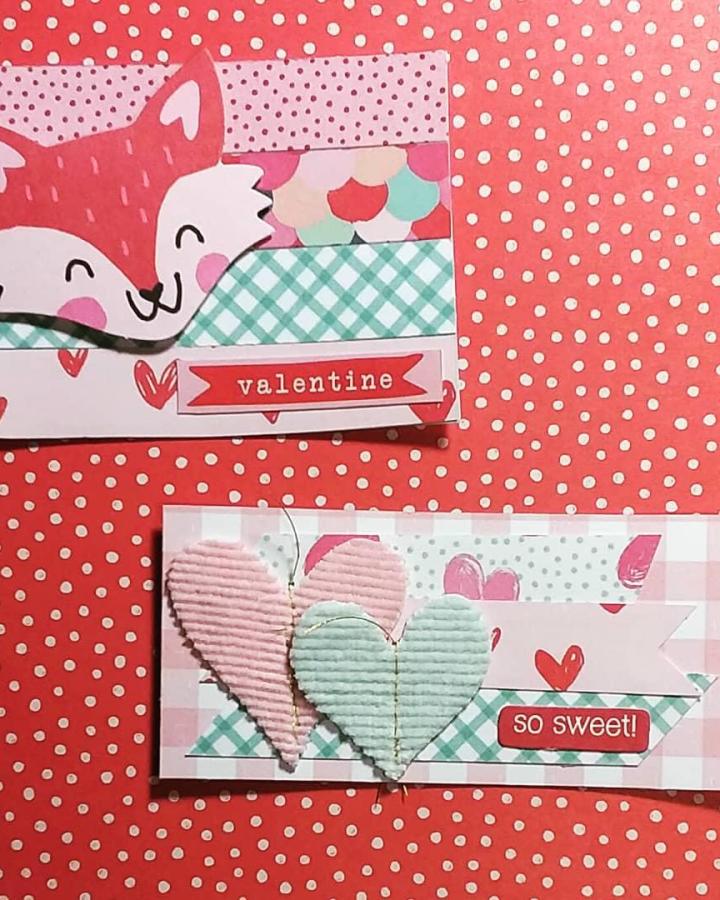 Pink and mint textured paper heart Valentines card on red polka dot background from @pinkkawaii2kute. Valentines paper craft ideas.