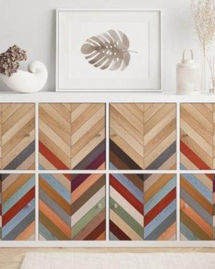 Chevron wood panel pattern on Ikea Kallax dresser front from WallvyDecal featuring colorful geometric design ikea kallax dresser hacks & ideas.