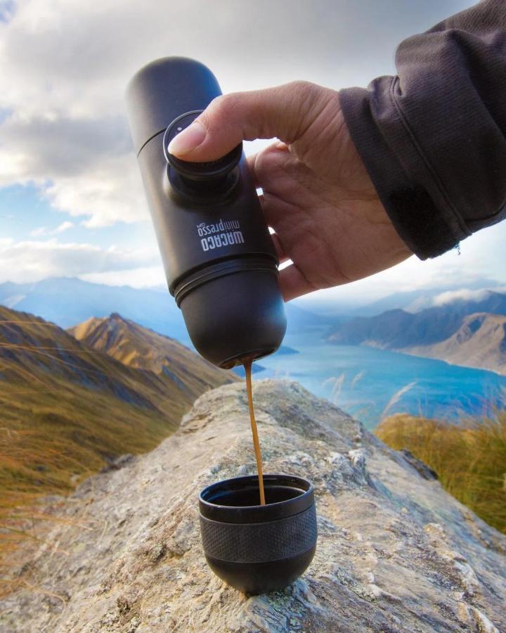 black portable espresso maker outdoors valentines gift ideas for him in nature setting