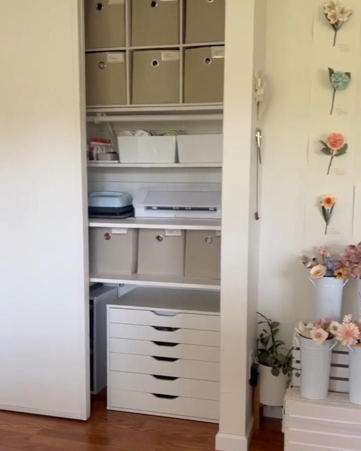Taupe bins and white shelves craft closet from @handmadebysarakim. Clean, labeled, and neatly stacked.