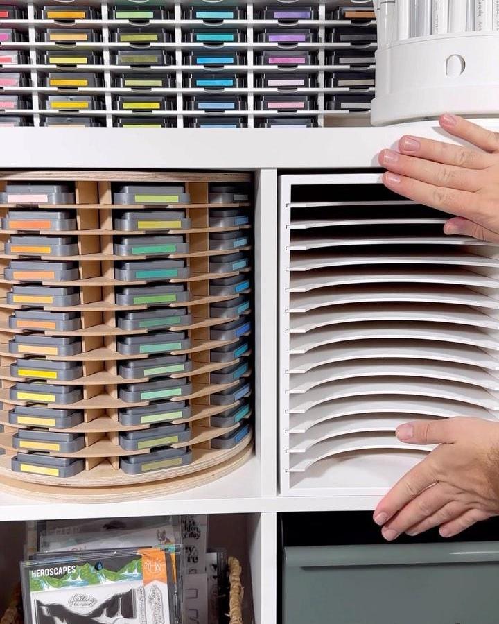 Gray and wood ink pad carousel craft room from @ralphtyndalldesigns. Colorful labels keep supplies tidy.