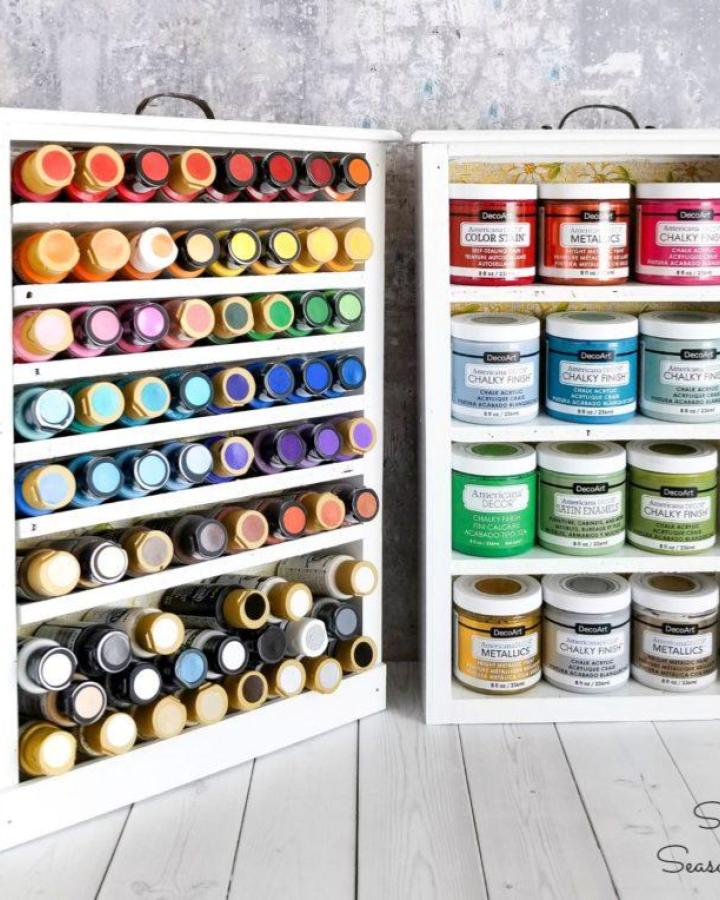 Soft rainbow paint racks from Sadie Seasongoods. portable paint storage for craft room organization ideas.