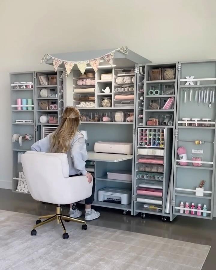 soft gray Dream Box craft station from @createroomco. Open cubbies and pastel supplies keep craft room organization ideas neat.