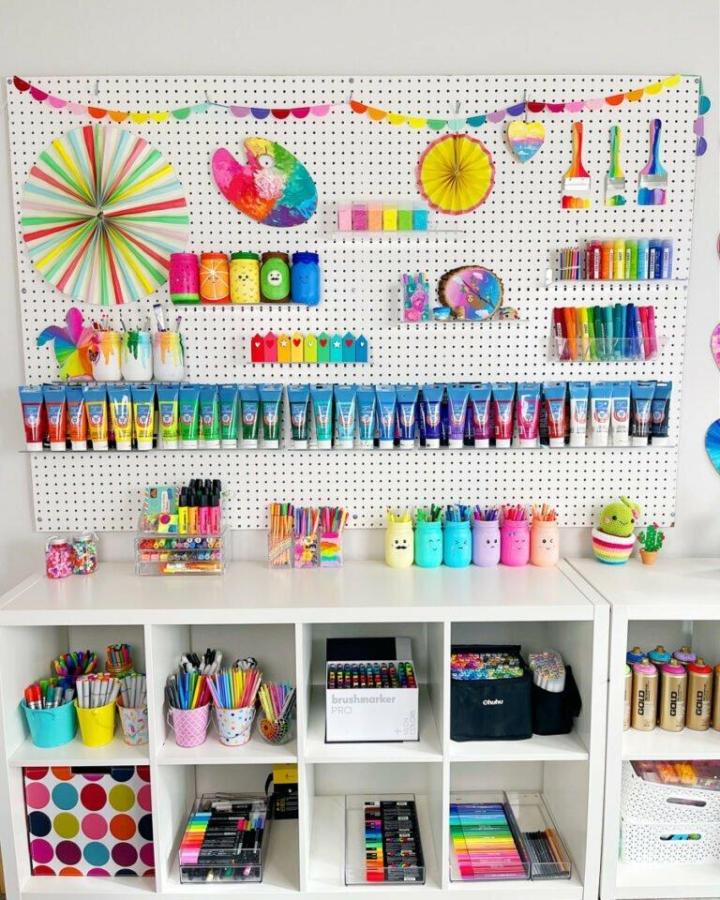 Colorful pegboard craft storage from Color Made Me Happy. Rainbow supplies and tidy cubbies.