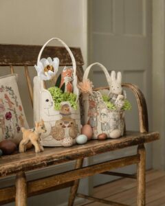 Cream and embroidered felt Easter baskets from @coralandtusk with playful bunny and woodland motifs for easter basket ideas.