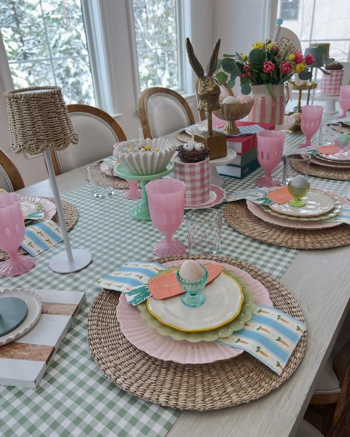 Green and pink gingham table runner with woven chargers and pastel Easter place setting ideas from @themollycollective. Natural, playful holiday decor.