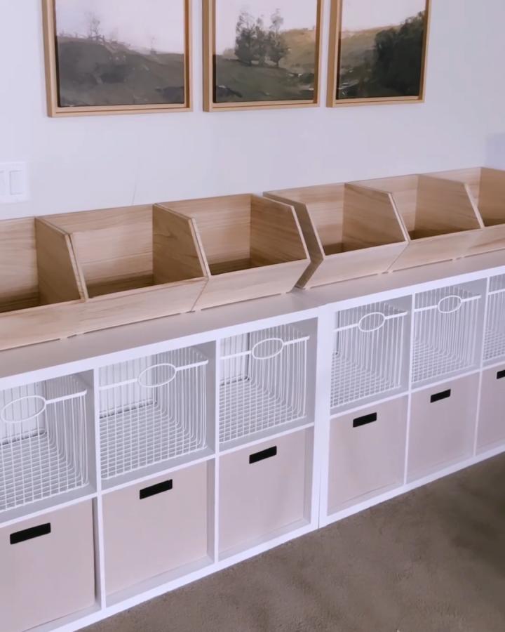 light wood and white toy storage from @ashleyrosereeves. angled cubbies over neat bins for ikea kallax toy storage ideas