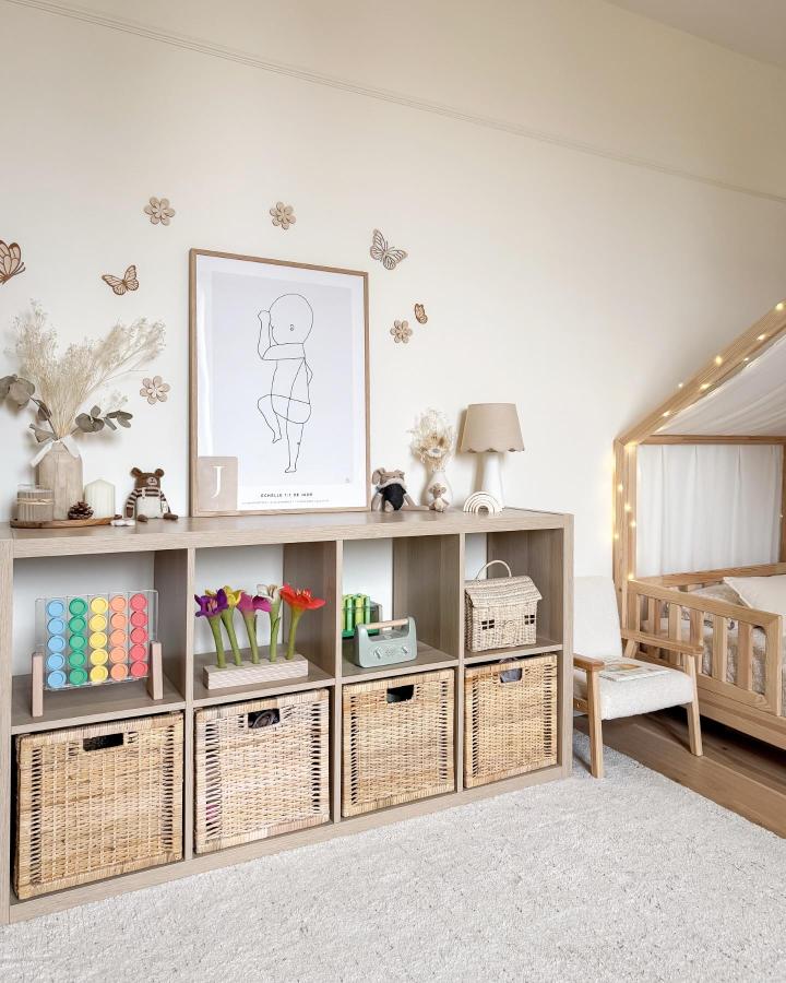 beige woven basket toy storage from @trendysides. Cozy Kallax cubbies with soft nursery styling and natural wood tones.