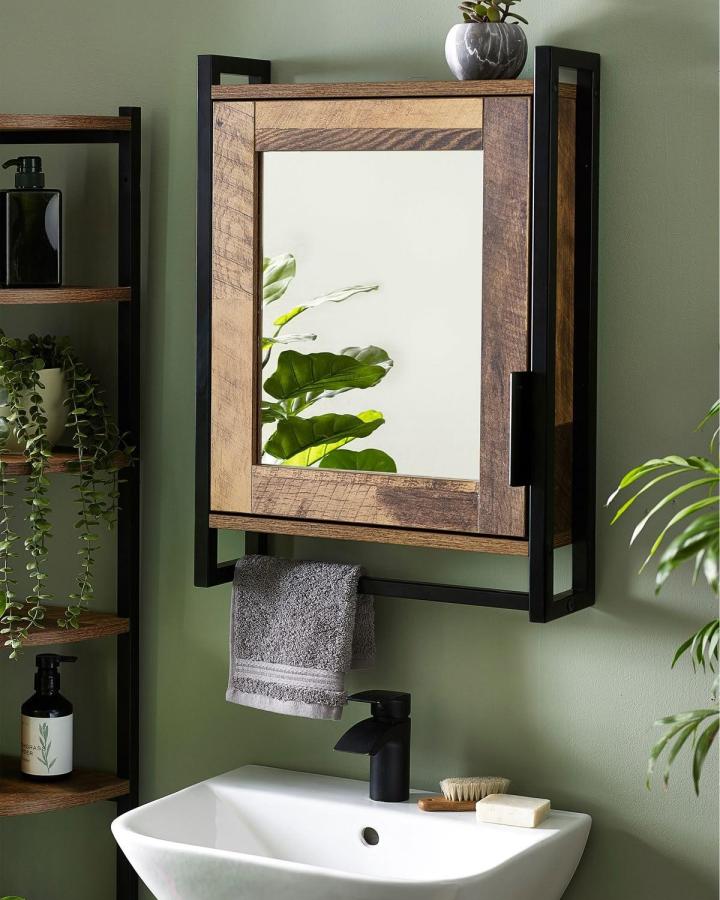 Rustic wood and black metal framed mirror cabinet from Next UK with towel rail perfect for bathroom mirror ideas for small spaces.