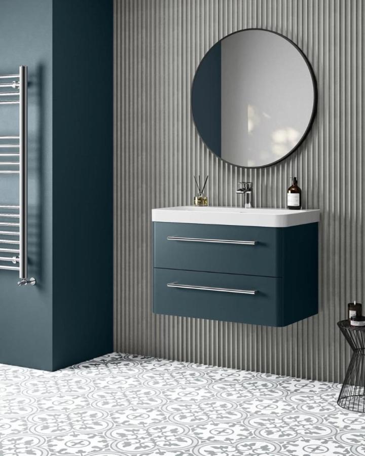 Gray textured vertical wall panels in bathroom from @wallsandfloors. Showcases modern bathroom wall panel ideas with floating vanity and patterned floor tiles.
