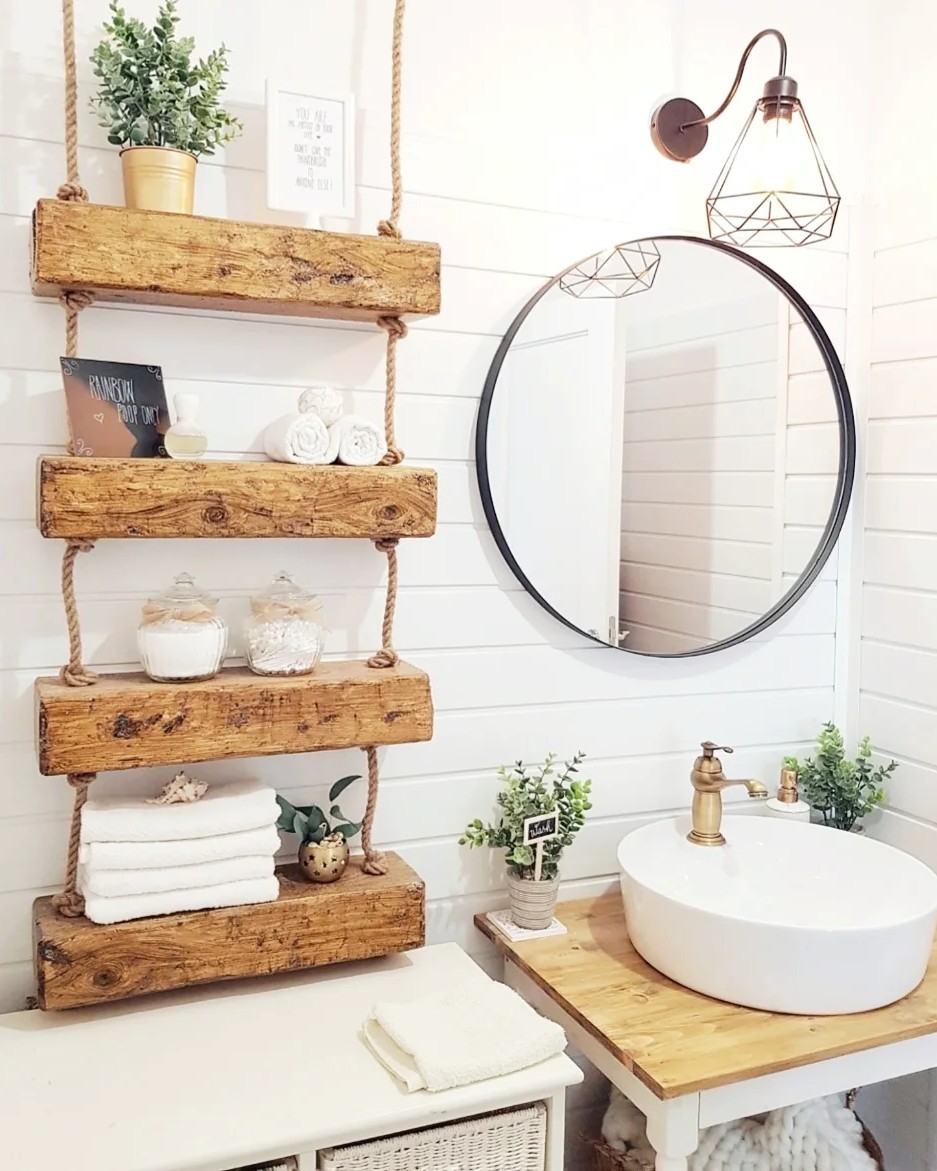 Rustic wood shelves and white horizontal paneling bathroom wall panel ideas from @anastinyplace. Cozy, bright, and inviting bathroom decor.