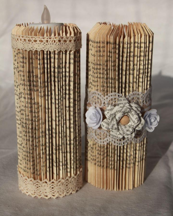 Vintage folded book page candle holders decorated with cream lace and paper flowers from SAShE.sk book page home decor crafts with rustic charm and soft textures