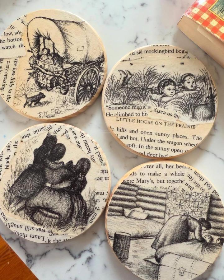 Faded black and white book page home decor crafts coasters from @watermanbookco featuring vintage story illustrations on wood.