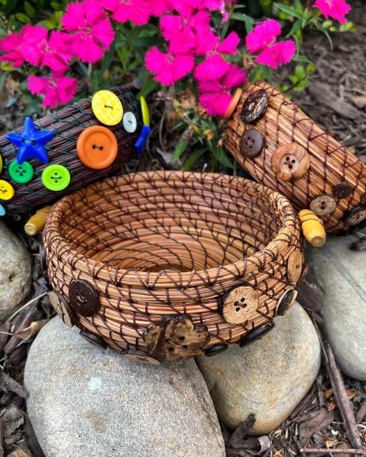 Natural woven basket decorated with mixed wood and colorful buttons from @basketsandart. Rustic button crafts for adults inspiration.