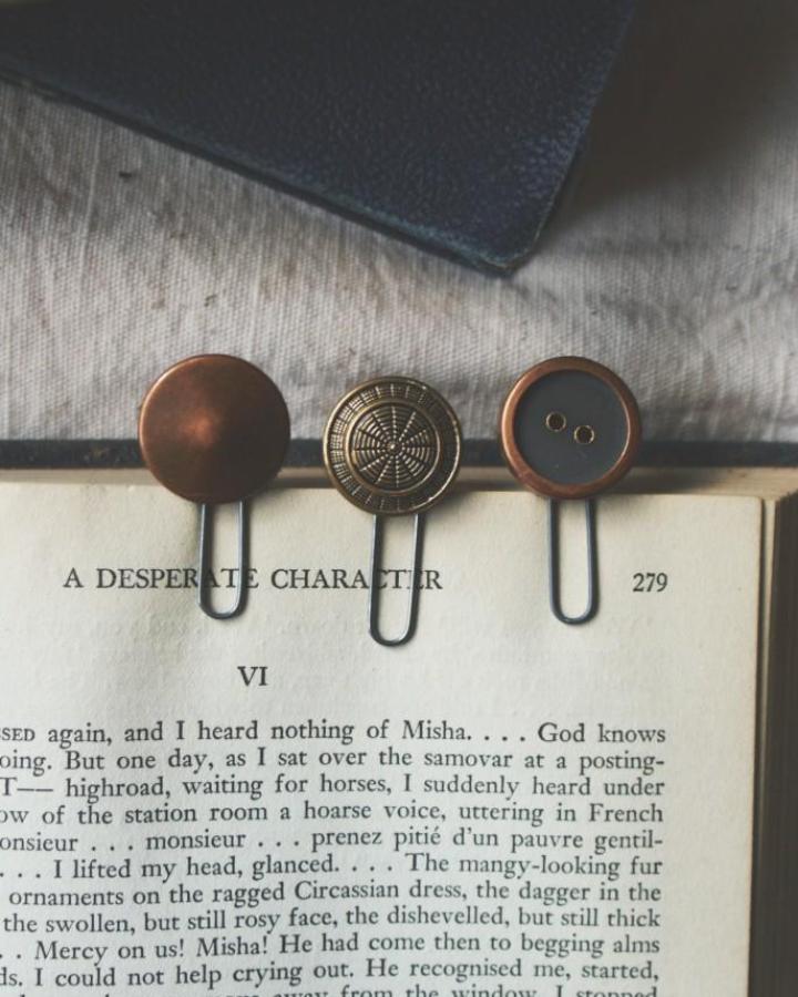 Copper and brass vintage button paperclips from theanastasiaco. Handmade bookmarks with button crafts for adults flair.
