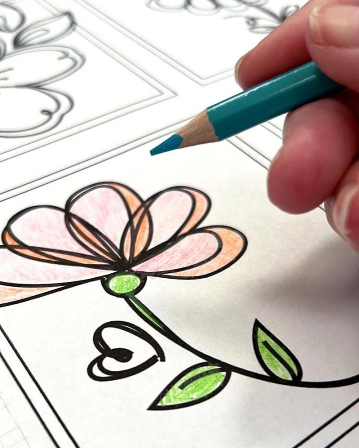 Soft pastel colored pencil flower design from 100directions. Perfect for mindful crafts for beginners calming creativity.