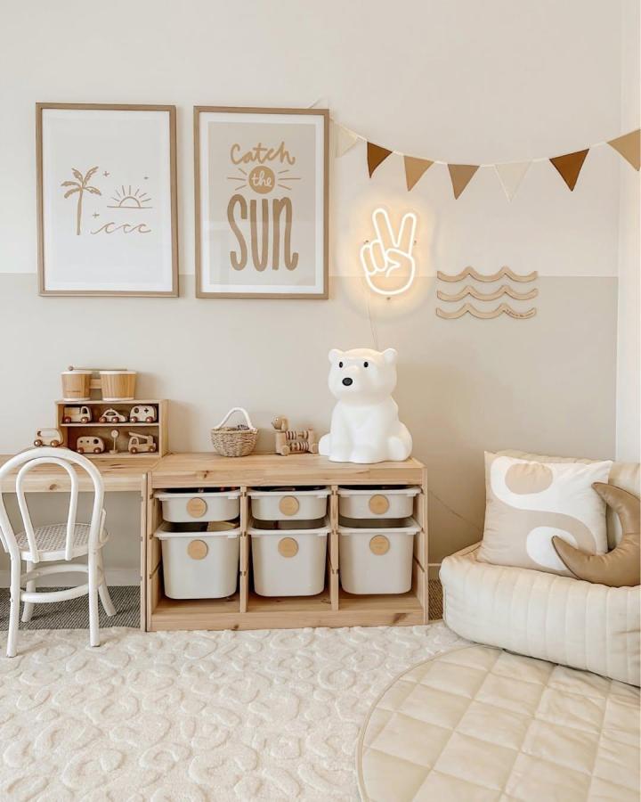 soft neutral wooden storage unit with beige bins from @our.home.trio ikea nursery storage ideas includes playful personal touches and cozy nursery decor