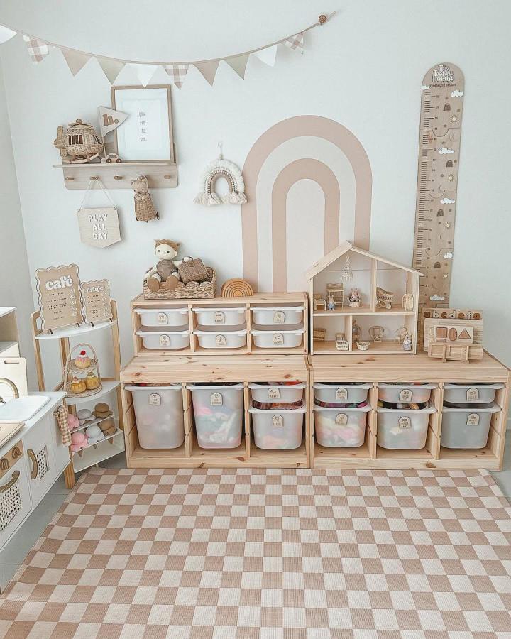 Soft beige and natural wood ikea nursery storage ideas from @the.toohey.tribe featuring modular bins and playful decor.