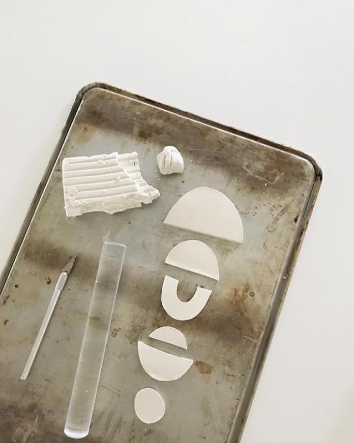 white air-dry clay geometric shapes on a metal tray from almostmakesperfect mindful crafts for beginners smooth minimal wall art pieces