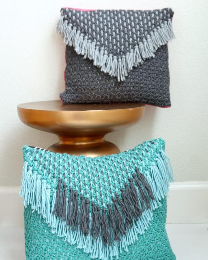 gray and aqua crochet tassel pillows from persialou showing mindful crafts for beginners with soft yarn and fringe textures