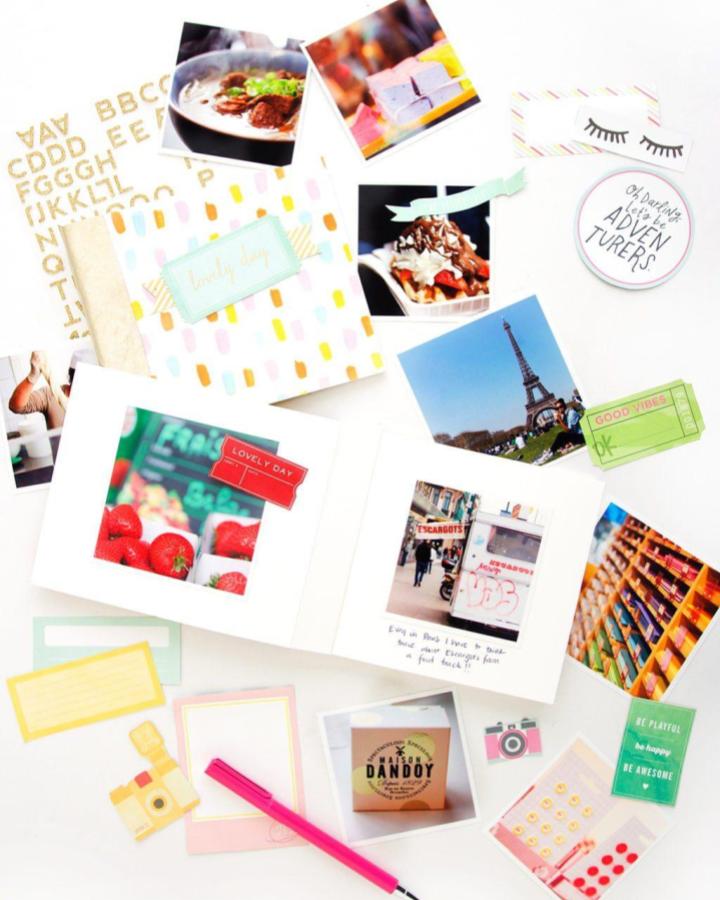 white pastel photo journal with colorful stickers and photos from damasklove mindful crafts for beginners scrapbooking idea