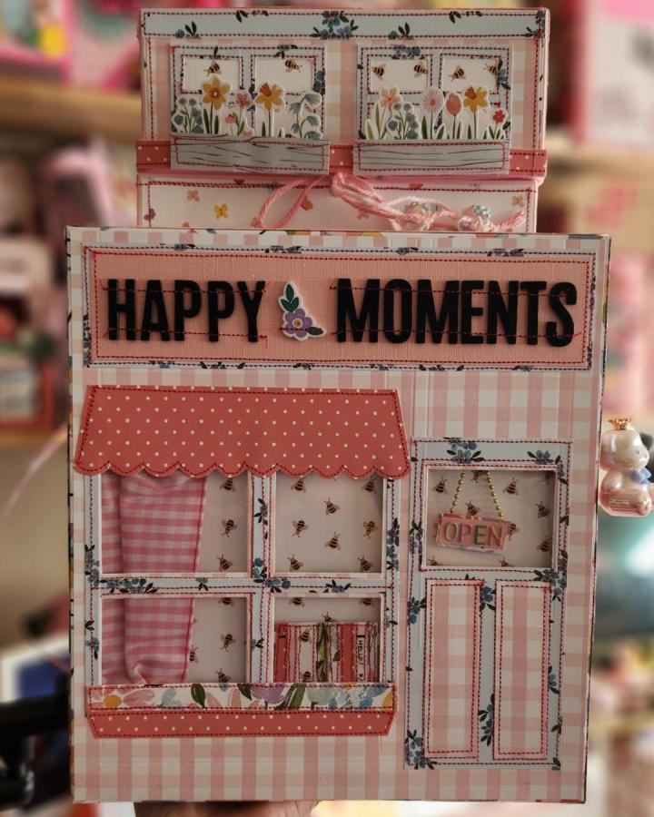 Pink gingham and floral layered storefront paper craft with stitched details by @niftycraftyme featuring bees and happy moments theme for paper crafts for adults.