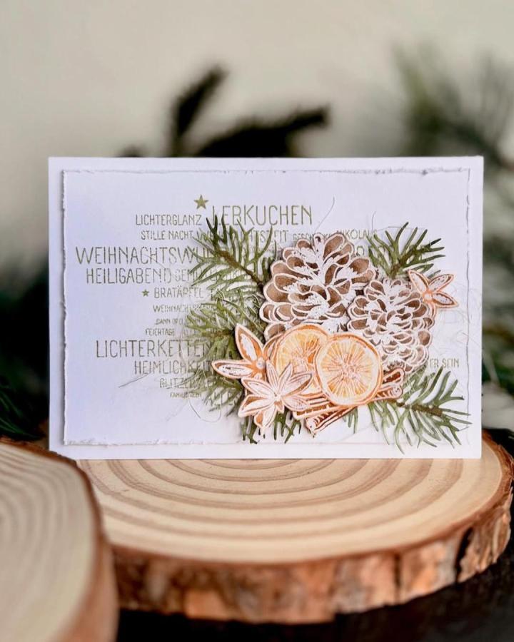 Warm toned pinecone paper craft card by @li.l.a12 featuring layered greens, oranges, and natural textures perfect for paper crafts for adults.