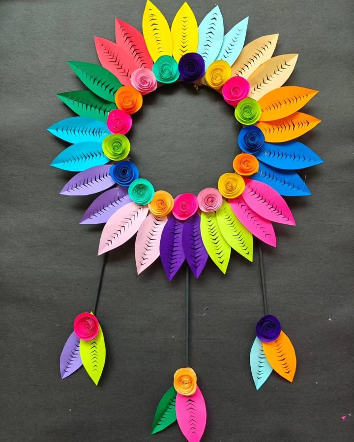 Bright multicolored paper leaf wreath with rolled roses and detailed cuts for paper crafts for adults by @creativesuu. Cheerful and intricate design.