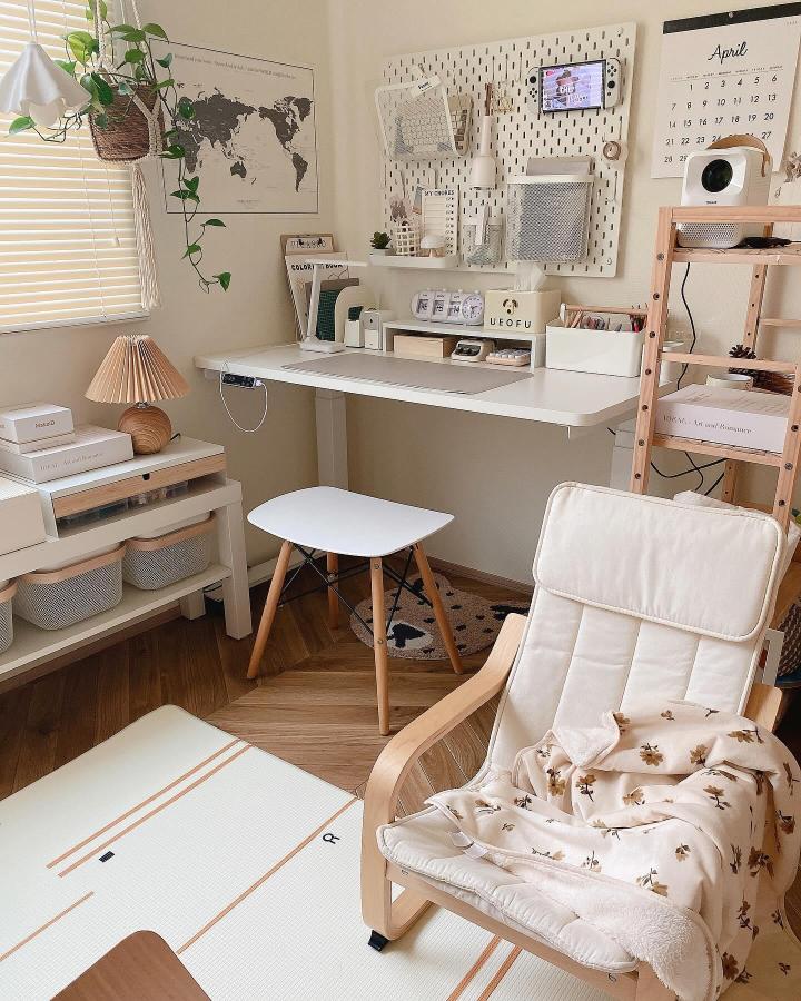 white and beige cozy ikea skadis craft room ideas pegboard workspace with wood accents from @aco__m.a__. Neat and minimal craft room setup.