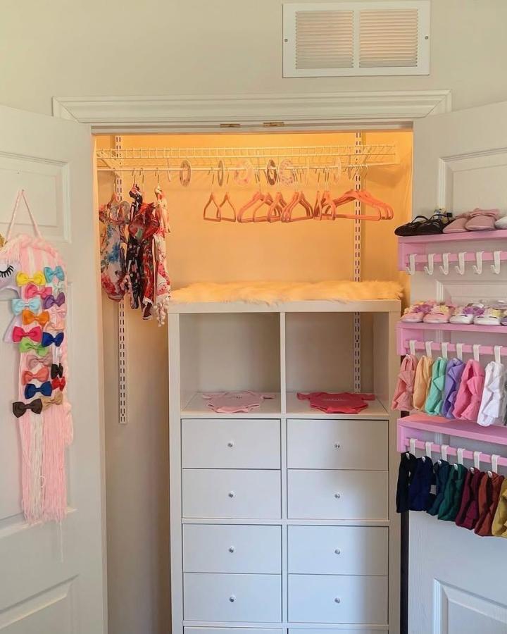 Pink wire rack and pastel hangers in closet showing repurposed Ikea storage for small colorful accessories by @ypiyale with soft cozy decor.