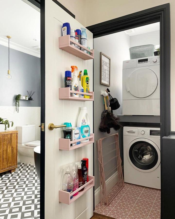 Pink Ikea spice rack storage on door used for cleaning supplies by @house_on_the_way shows creative ikea spice rack hacks for small spaces.