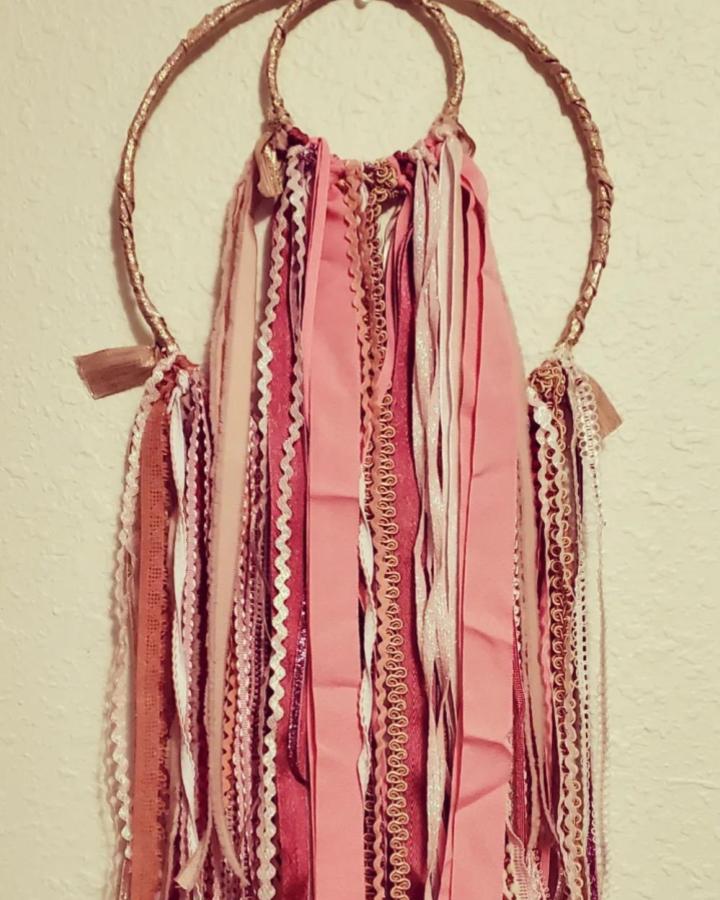 Pink and gold ribbon wall hanging with mixed textures from @nap_queenie showcasing ribbon crafts for adults in decorative home decor style.