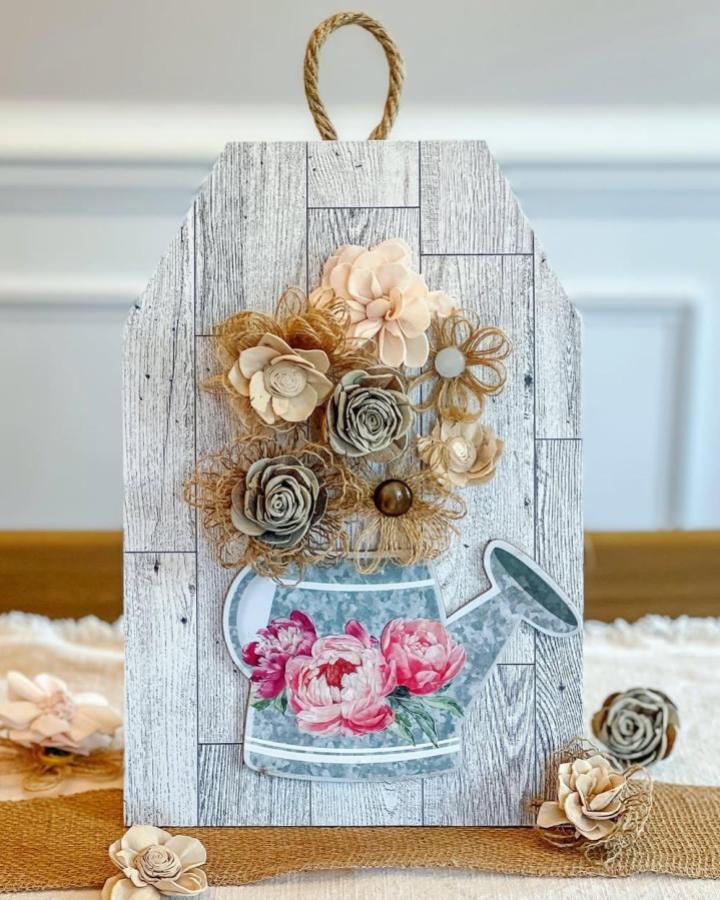 Rustic burlap flower ideas wall decor from @rebeccavirginiadiy with watering can and soft floral accents.