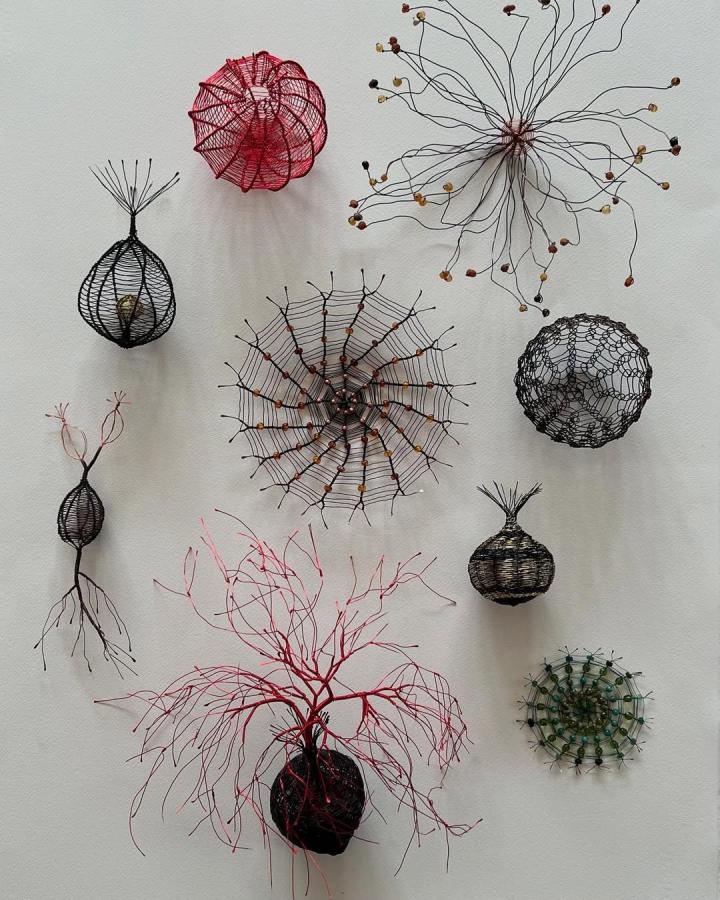 Abstract copper wire wall sculptures with beads and mixed colors from @sallyblakeartist. Unique copper wire crafts with organic shapes and texture.
