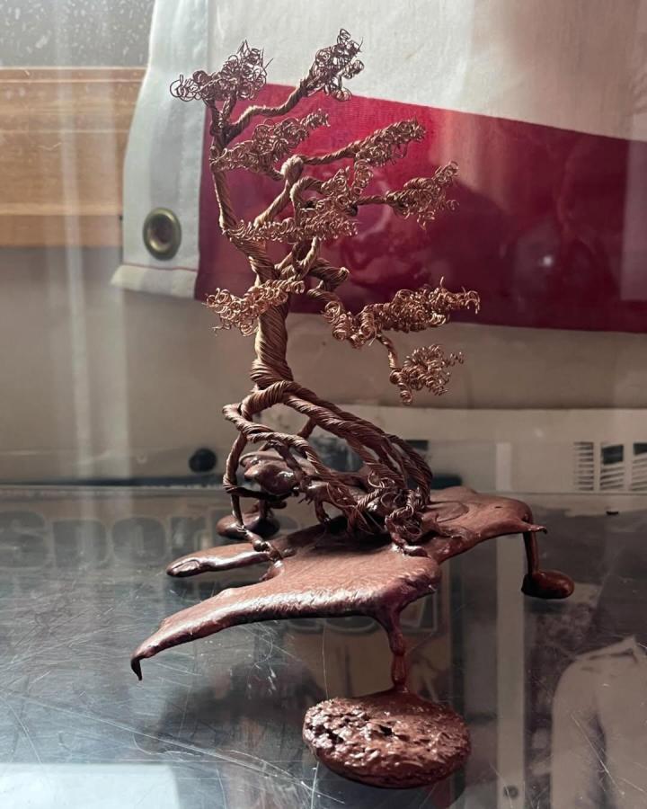 Copper toned twisted wire bonsai tree sculpture on a handmade base by @smeltedroots detailed and delicate wirework craft.