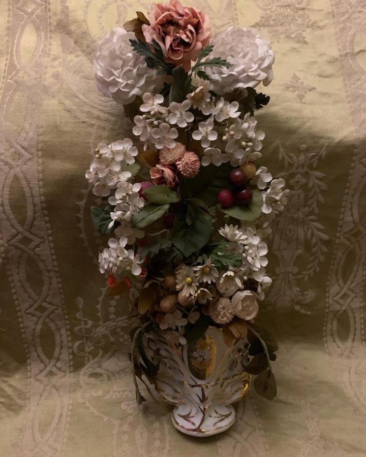 Soft pastel vintage style fabric floral arrangement in detailed ornate gold vase from @brocanterose. Timeless, layered textile blooms with natural touches.