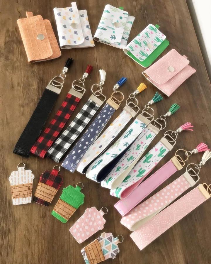 Pink and patterned wristlet straps and small cases from @every_day_crafts showing bright and textured handmade accessories with faux leather accents.