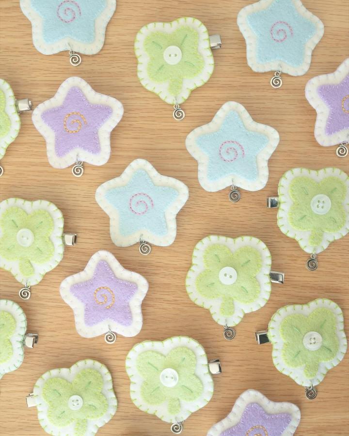 Pastel felt star and clover clips with buttons and spiral wire accents by @whostolemypencils for creative adult crafting projects.
